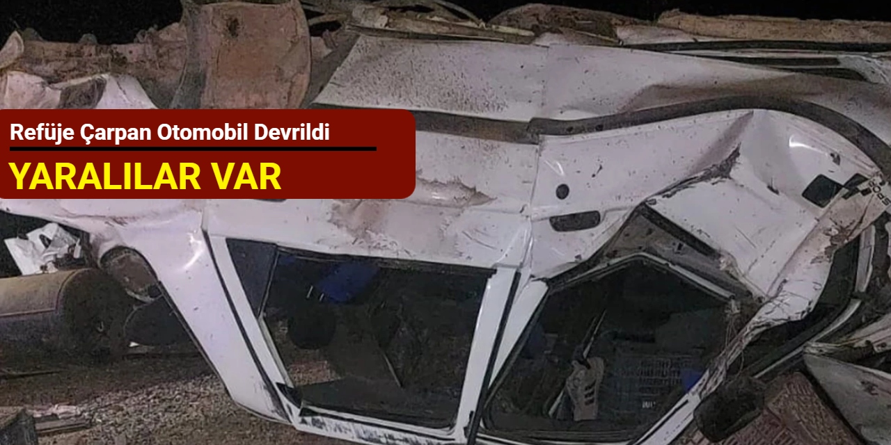 Refüje çarpan otomobil devrildi: Yaralılar var